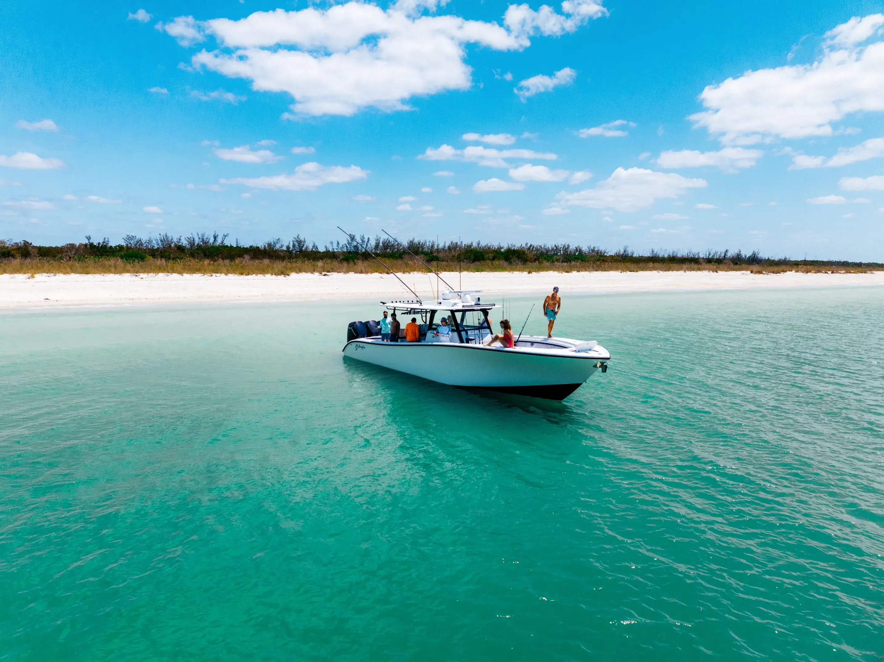 Boat crossing turquoise water
